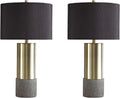 Signature Design by Ashley Jacek Contemporary Table Lamp, 2 Count, 3 Way Switch, Metal, Poly Resin and Drum Shade, 15' W x 15' D x 27.25' H, Gray & Brass Finish