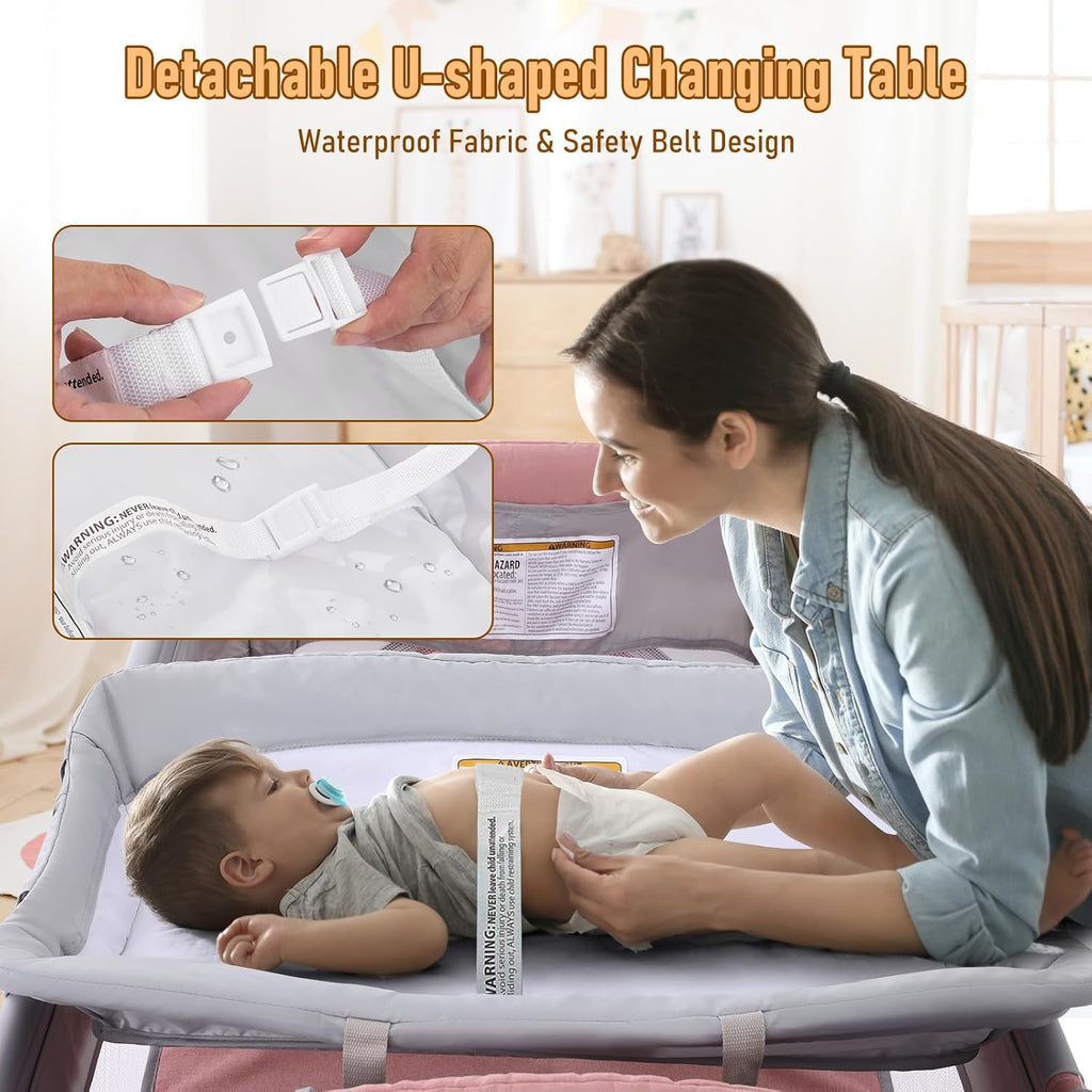 Jaoul 5 in 1 Baby Crib, Bassinet Beside Sleeper, Pack and Play with Bassinet and Changing Table Portable Travel Baby Playpen with Toys & Music Box, Mattress for Girl Boy Infant Newborn Pink