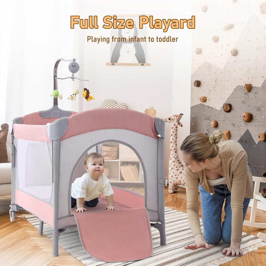 Jaoul 5 in 1 Baby Crib, Bassinet Beside Sleeper, Pack and Play with Bassinet and Changing Table Portable Travel Baby Playpen with Toys & Music Box, Mattress for Girl Boy Infant Newborn Pink
