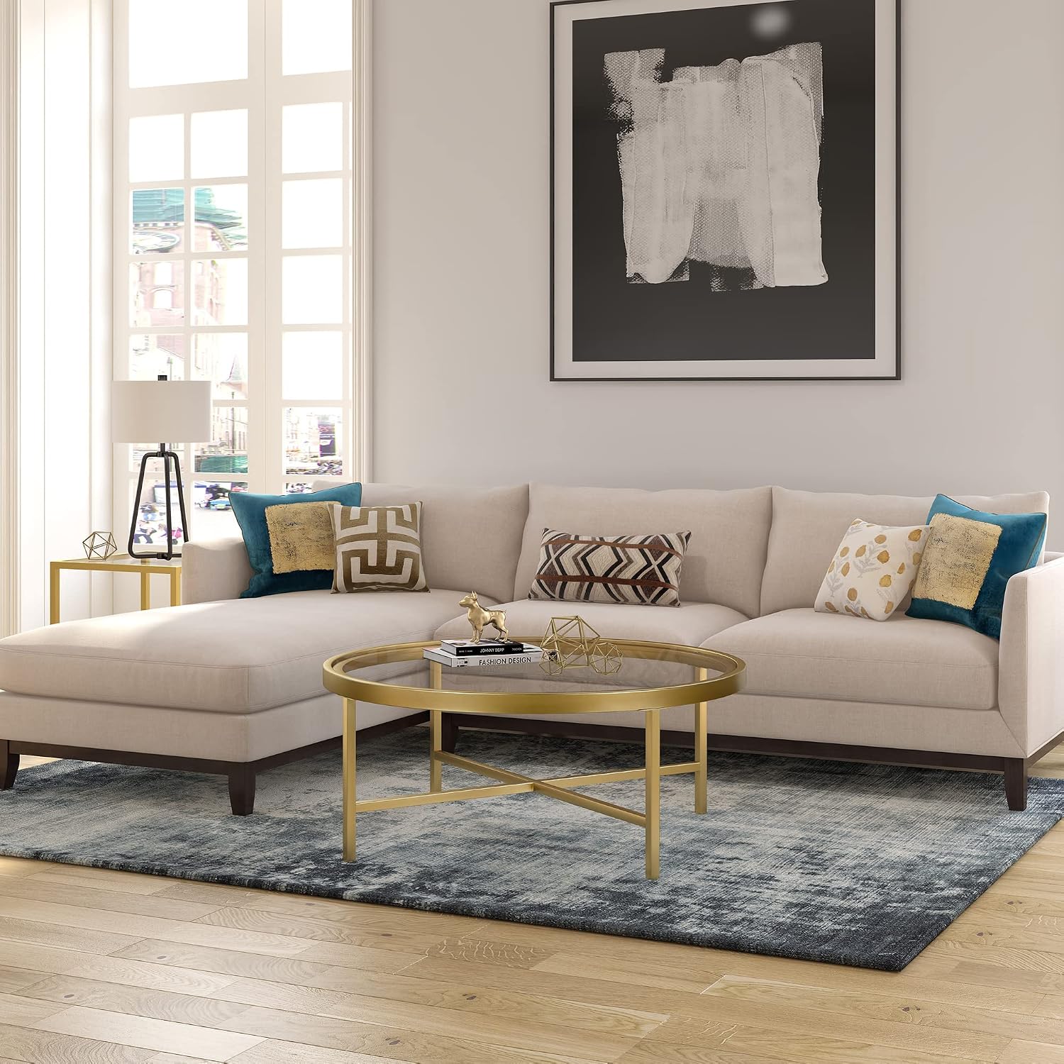 Henn&Hart 36' Wide Round Coffee Table with Glass Top in Brass, Modern coffee tables for living room, studio apartment essentials