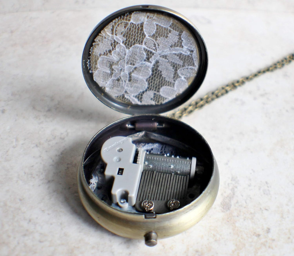 Dandelion Wish Music Box Locket in Bronze