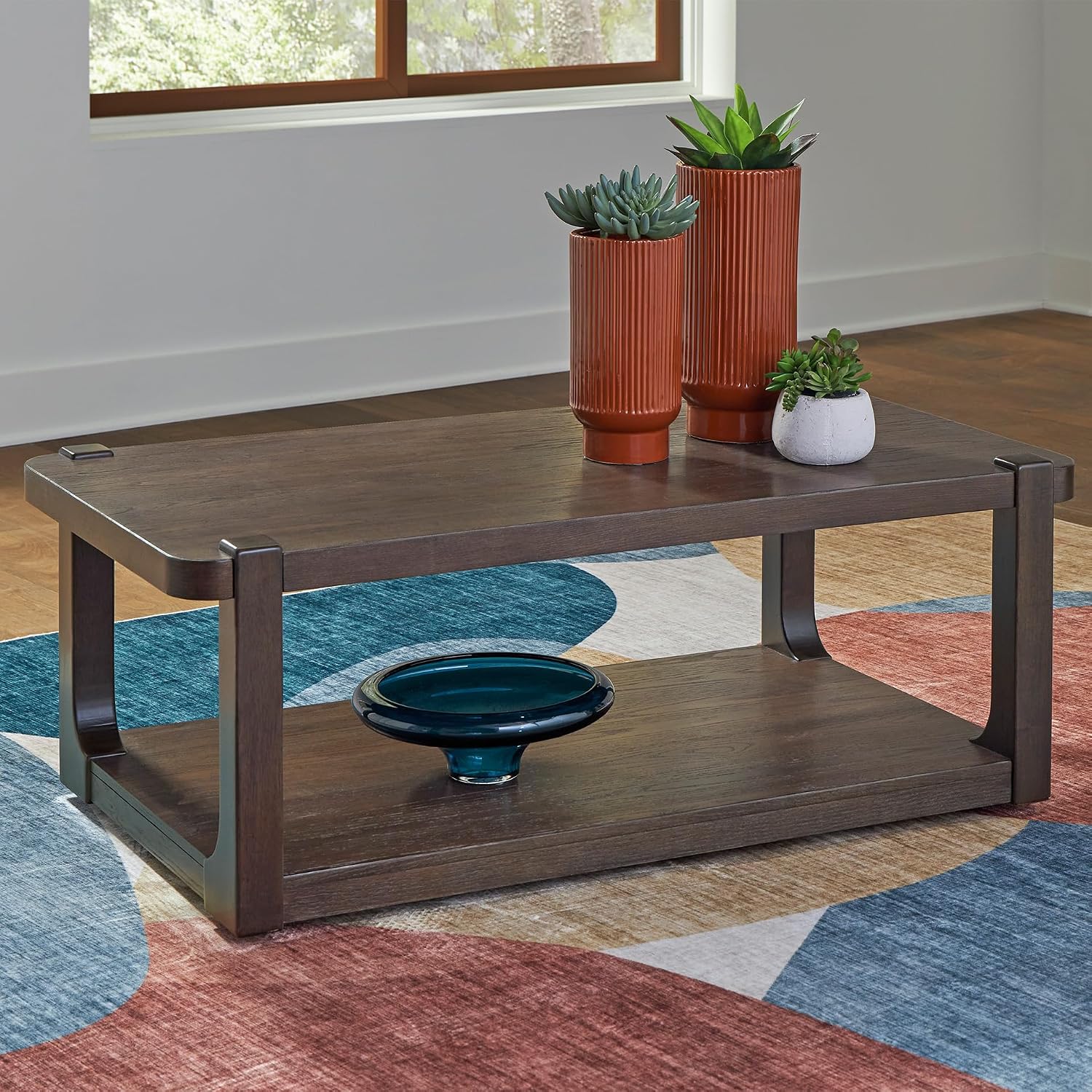 Signature Design by Ashley Breckington Contemporary Coffee Table with Lower Shelf and Casters, Dark Brown