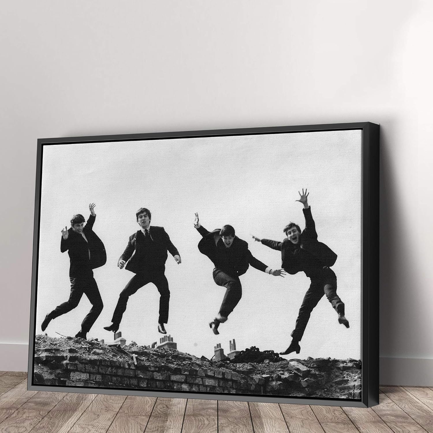 Vintage Rock Band Canvas Wall Art | Black & White Musicians Jumping Print | Retro Home Décor – Various Sizes (36in x 24in Modern Black Framed)